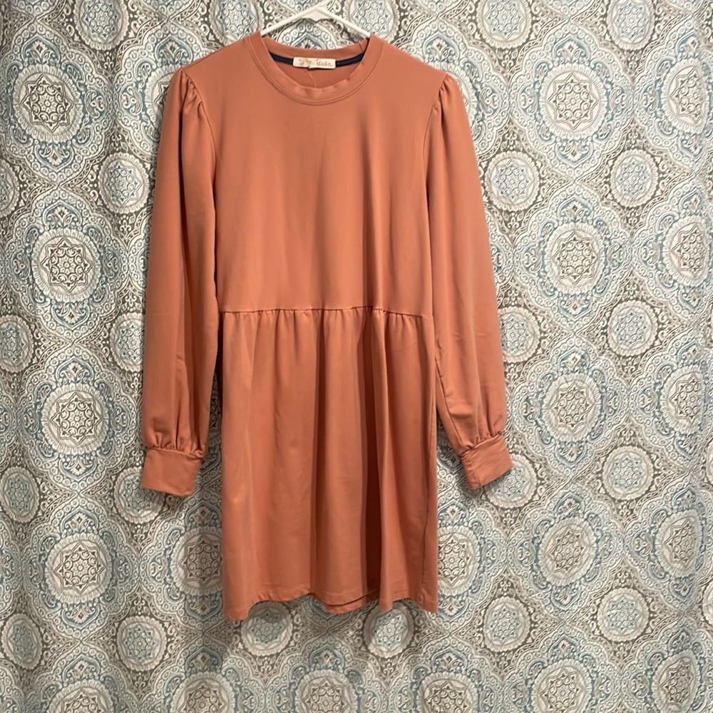 Rewind baby doll dress size medium in a blush pink